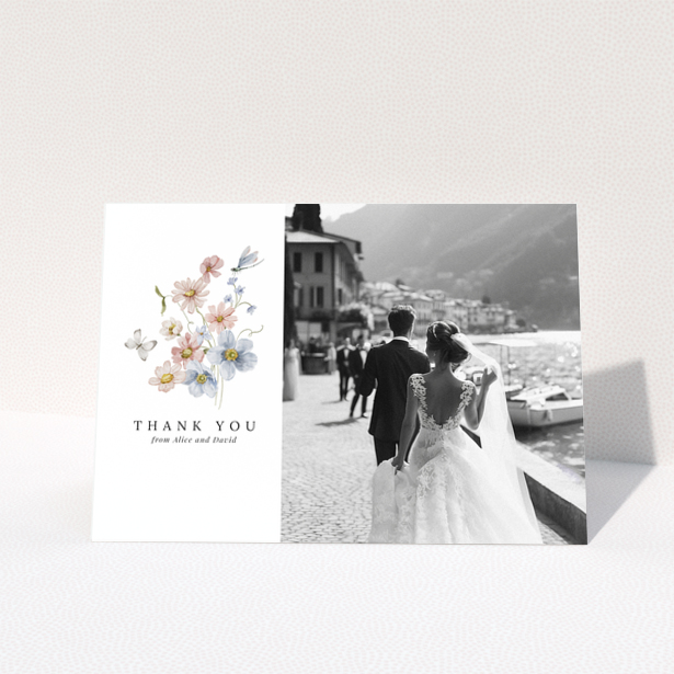 Wedding thank you card design with floral illustration and a photo of a bride and groom.