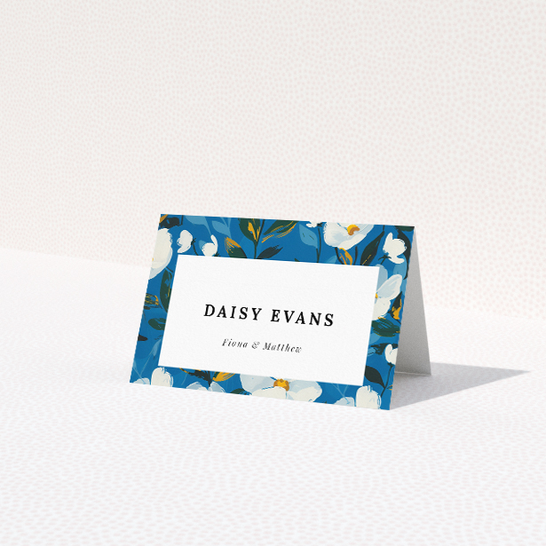 White Flower Blues place cards featuring a striking border of white flowers against a deep blue backdrop. This is a view of the front