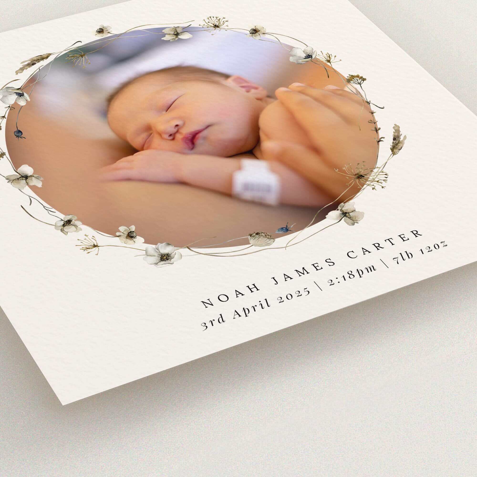 Floral birth announcement card design with one photo of a newborn baby.