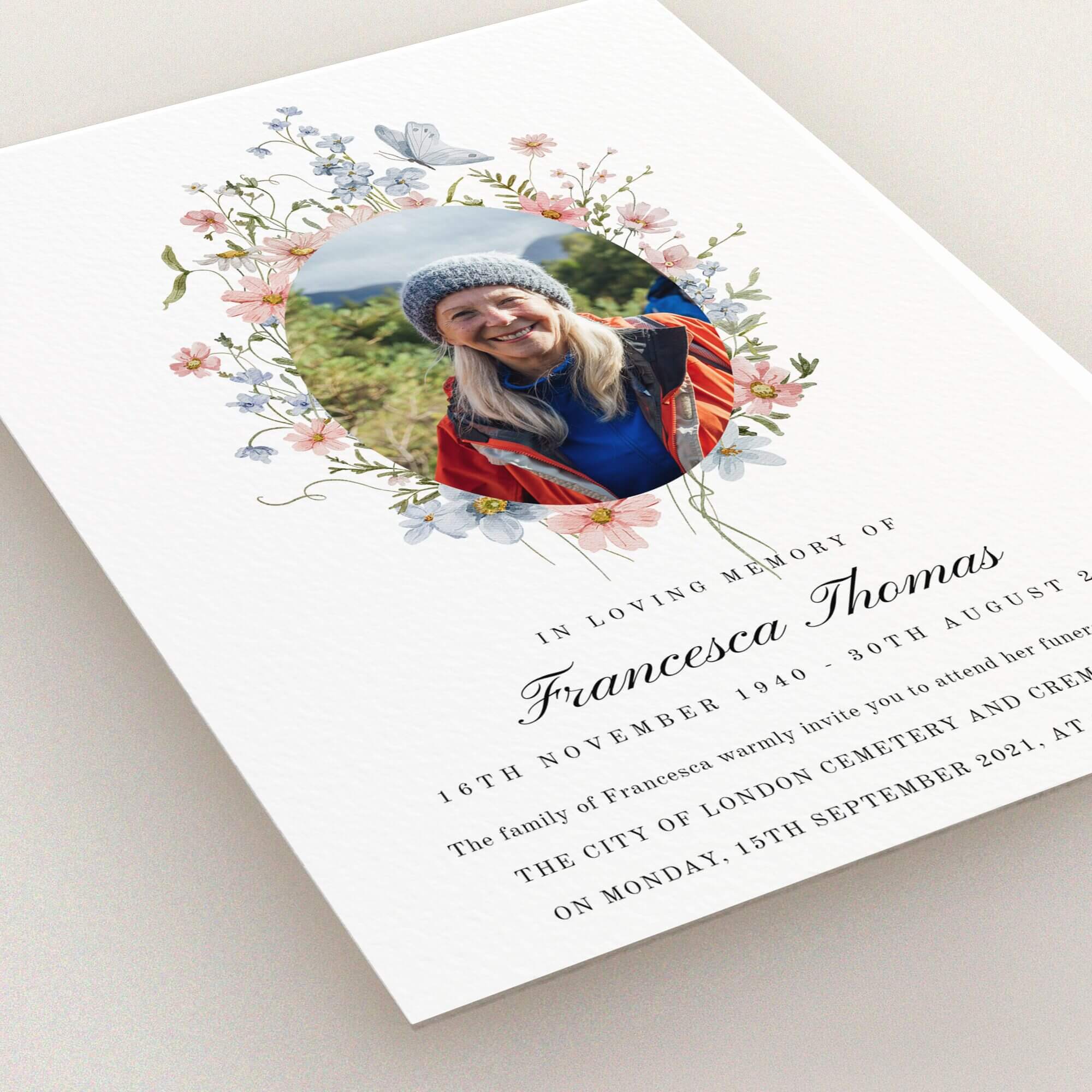 Floral design funeral announcement with one photo of a woman wearing a hat.