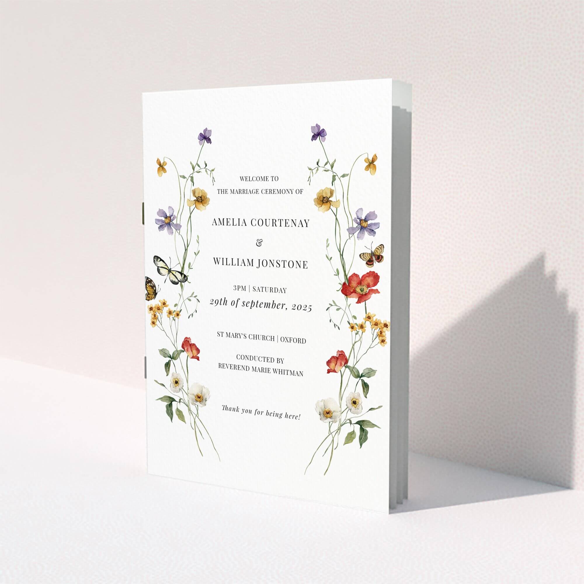 Floral wedding order of service program design with butterfly illustrations and decorative text.