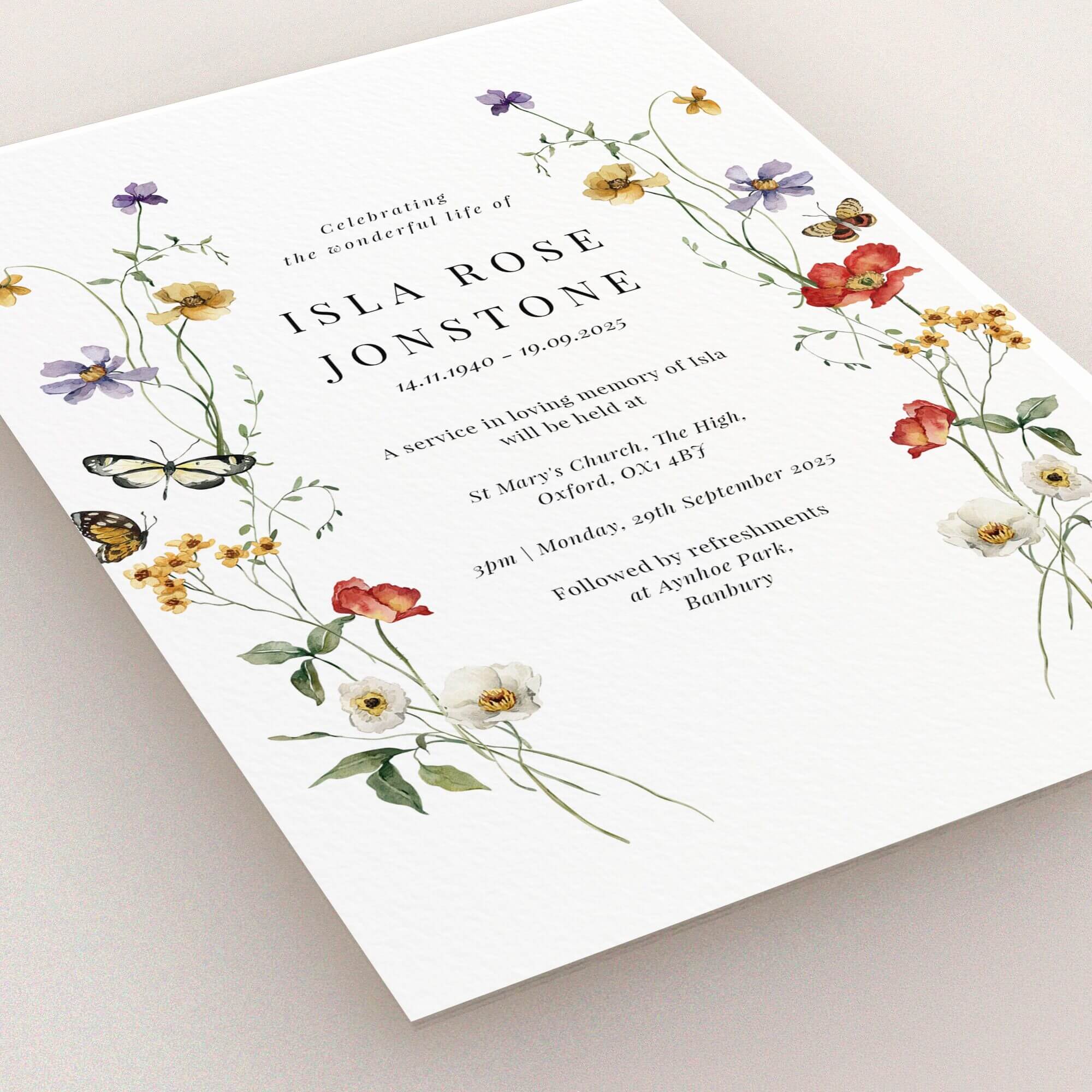Funeral announcement card with floral design and two butterfly illustrations.