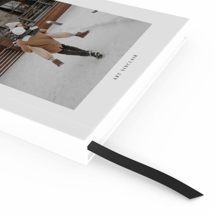 Portrait-oriented notebook design with a snow-themed cover featuring one photo, created by Utterly Printable for personalised stationery.