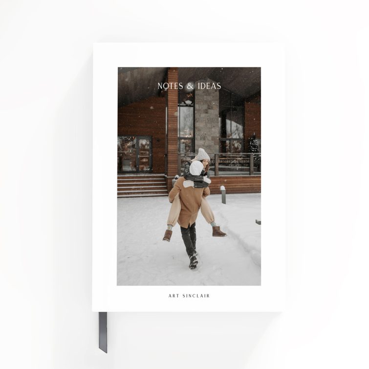 Portrait-oriented notebook design with a snow-themed cover featuring one photo, created by Utterly Printable for personalised stationery.