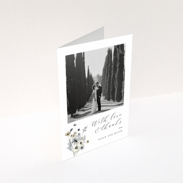 Wedding thank you card with floral design and one photo of a newlywed couple.