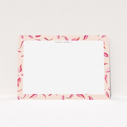 A womens correspondence card design titled "Petal confetti". It is an A6 card in a landscape orientation. "Petal confetti" is available as a flat card, with tones of pink, red and white.