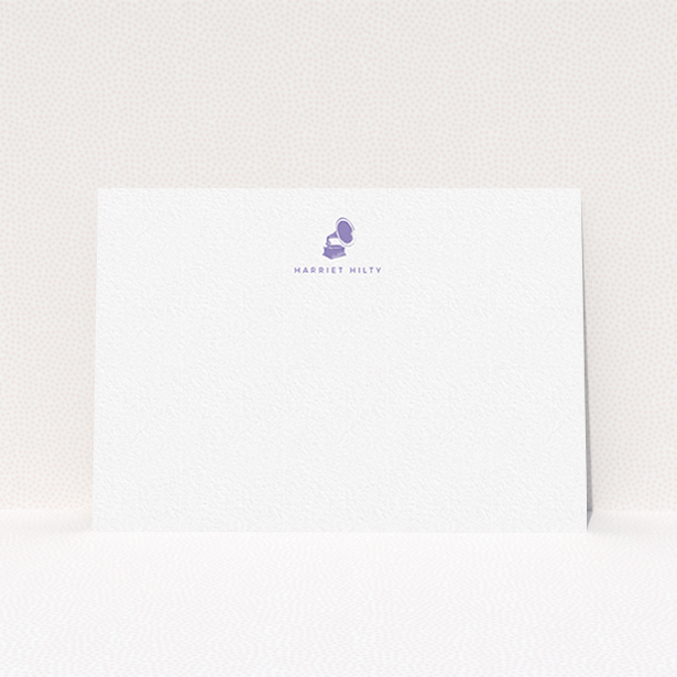 A womens correspondence card design titled "Purple music". It is an A6 card in a landscape orientation. "Purple music" is available as a flat card, with tones of white and purple.