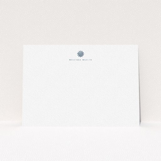 A womens correspondence card called "Sundial in the shade". It is an A6 card in a landscape orientation. "Sundial in the shade" is available as a flat card, with tones of white and blue.