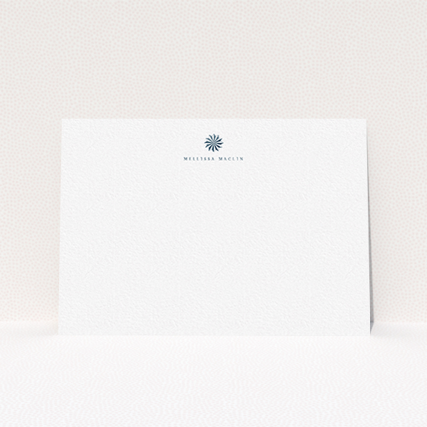 A womens correspondence card called "Sundial in the shade". It is an A6 card in a landscape orientation. "Sundial in the shade" is available as a flat card, with tones of white and blue.