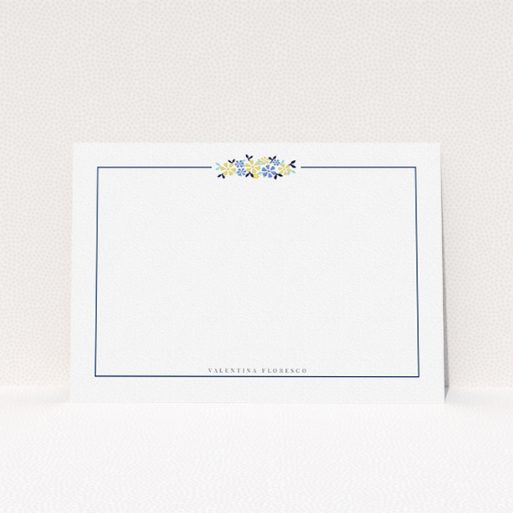 A womens correspondence card design named "Surrounded by flowers". It is an A5 card in a landscape orientation. "Surrounded by flowers" is available as a flat card, with tones of white and blue.