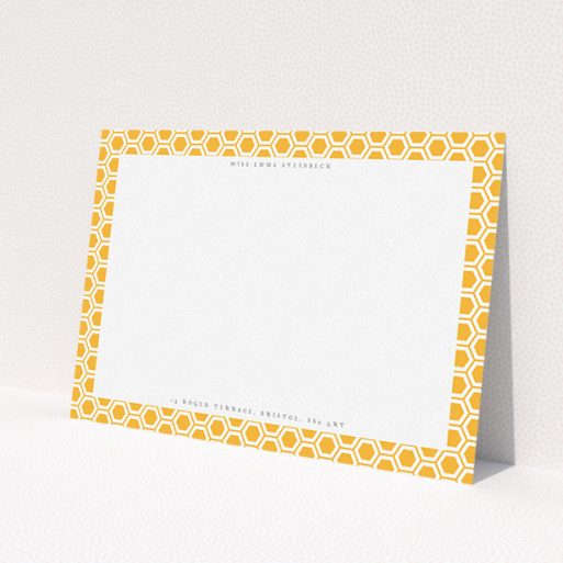 A womens correspondence card design titled 'The honeycomb'. It is an A5 card in a landscape orientation. 'The honeycomb' is available as a flat card, with tones of orange and white.