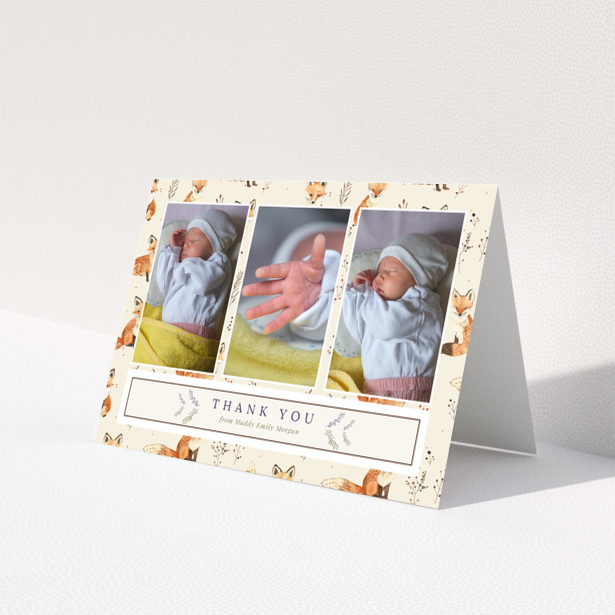 Baby thank you card with three photos of a newborn and fox-themed background