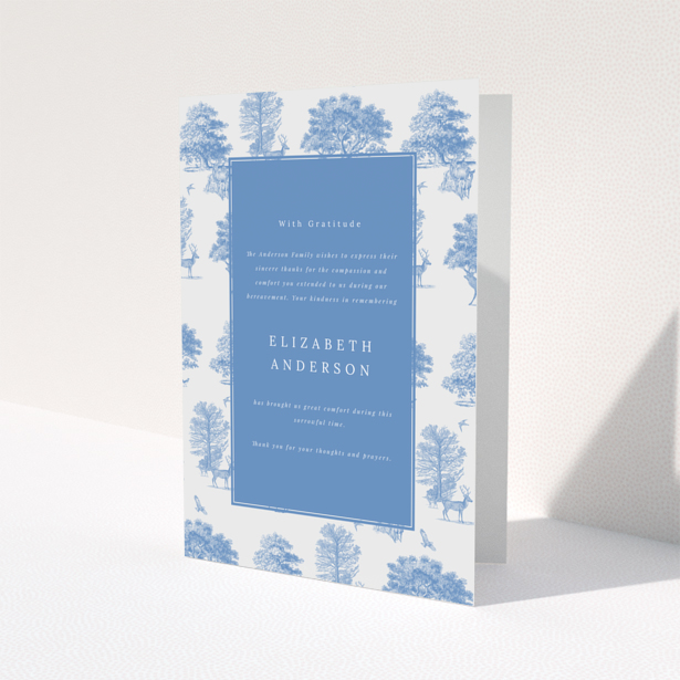 Blue and white funeral thank you card with one photo and tree and deer illustrations