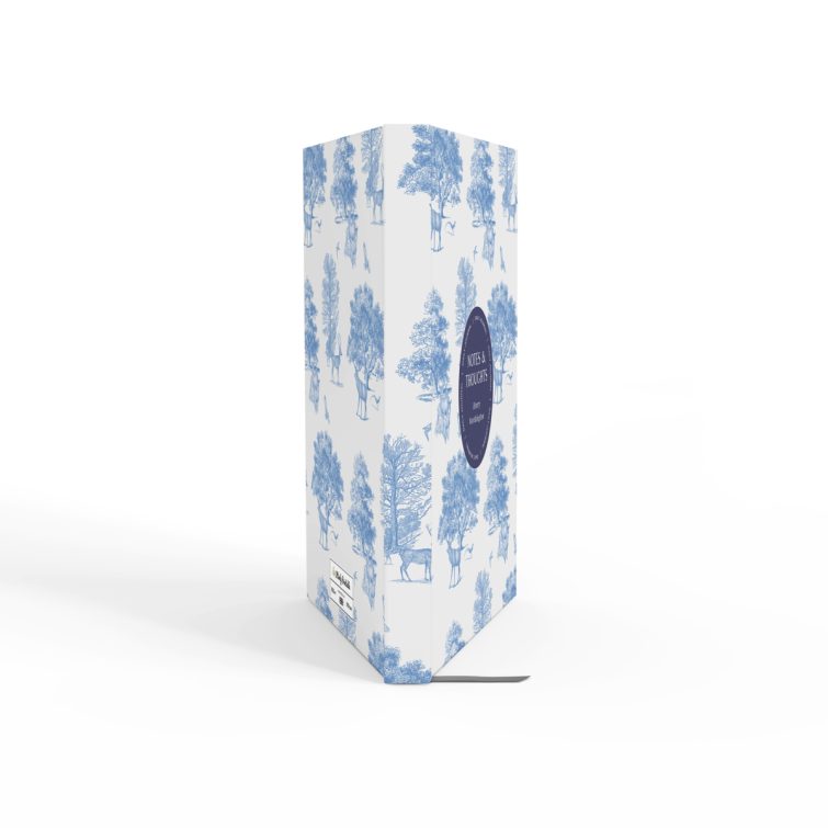 Blue and white nature-themed notebook cover design with illustrations of deer and trees, featuring one central photo placeholder.