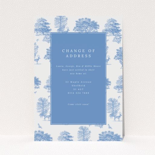 Change of address card with blue and white nature-themed design, featuring two photos of trees and deer.