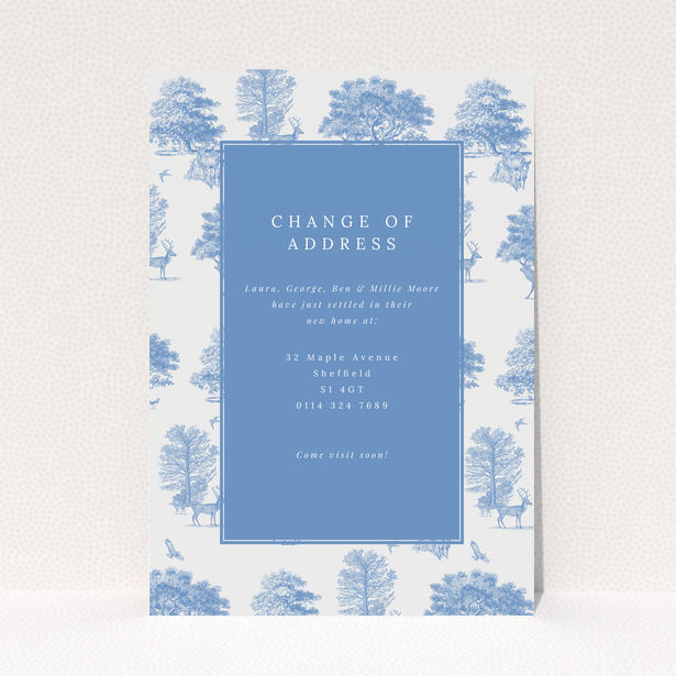 Change of address card with blue and white nature-themed design, featuring two photos of trees and deer.